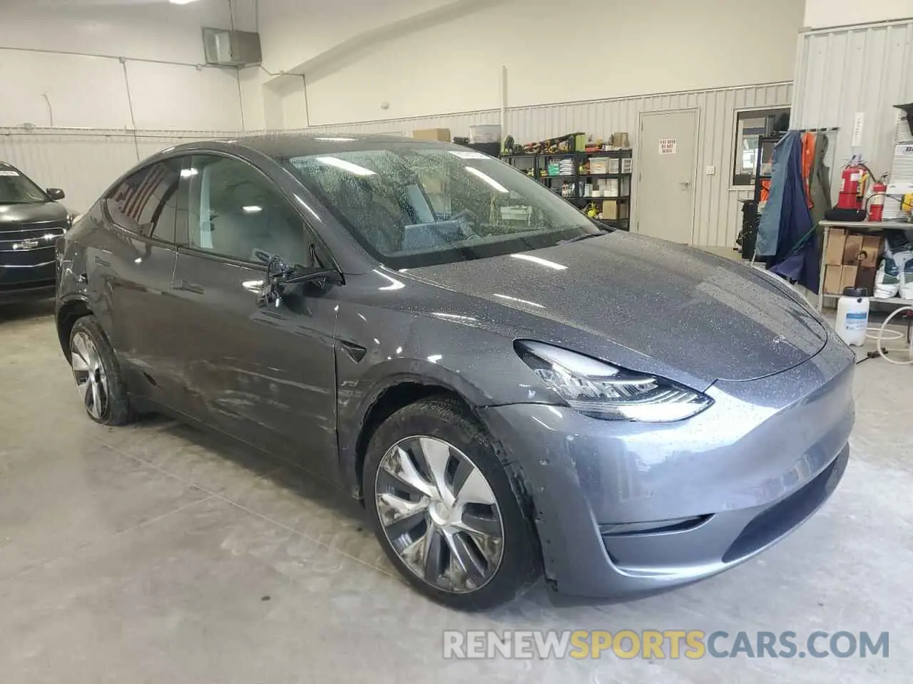 4 Photograph of a damaged car 7SAYGDEEXNA005385 TESLA MODEL Y 2022