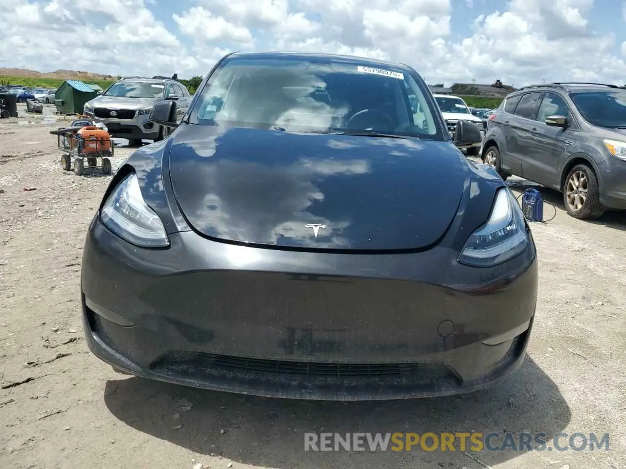5 Photograph of a damaged car 7SAYGDEEXNA013681 TESLA MODEL Y 2022