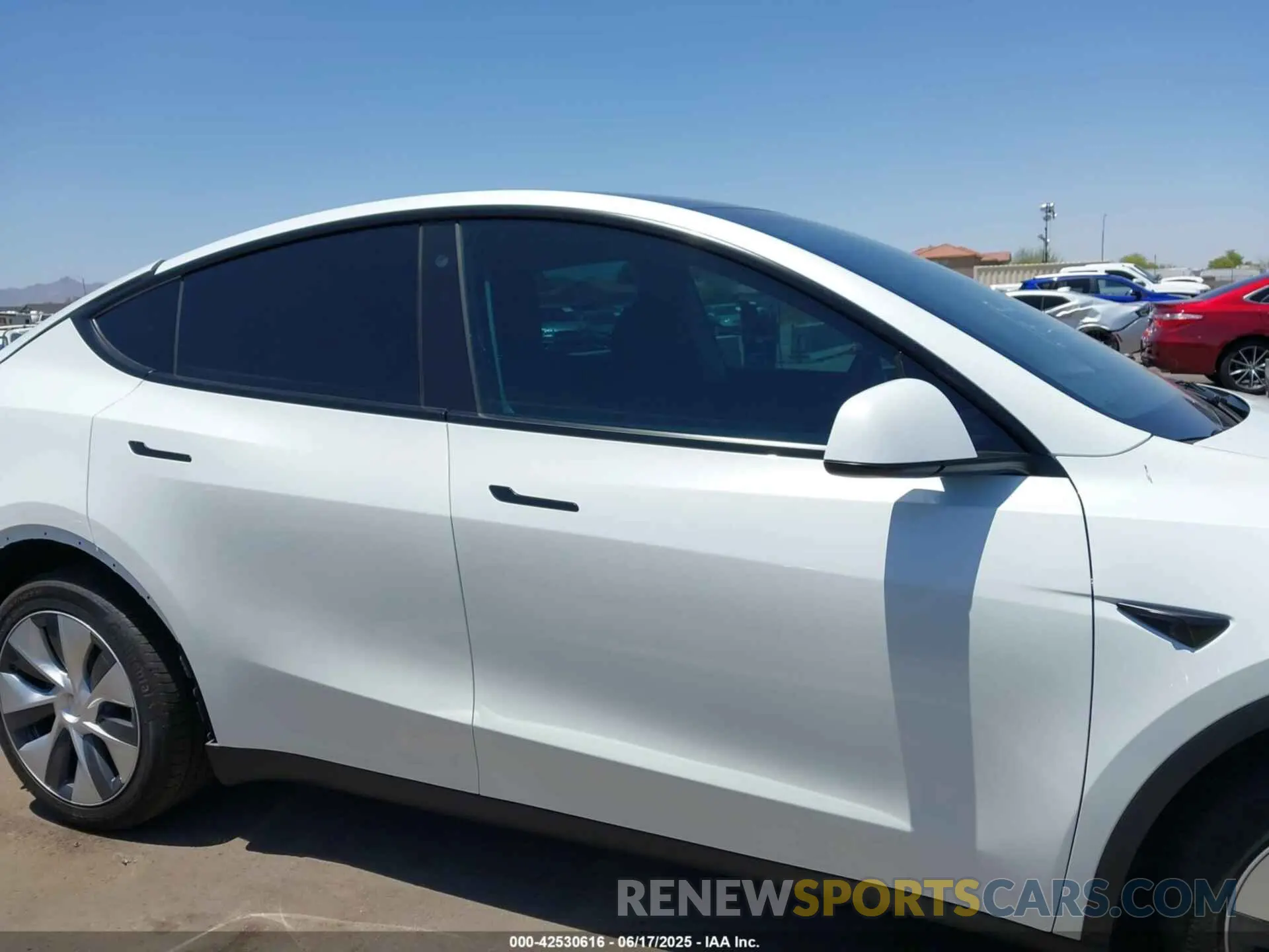 12 Photograph of a damaged car 7SAYGDEEXNA014247 TESLA MODEL Y 2022