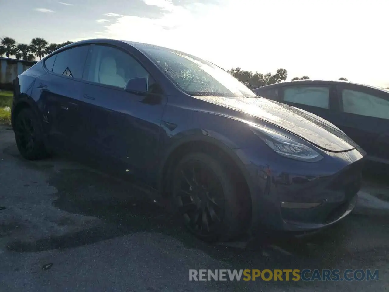 4 Photograph of a damaged car 7SAYGDEEXNF310825 TESLA MODEL Y 2022