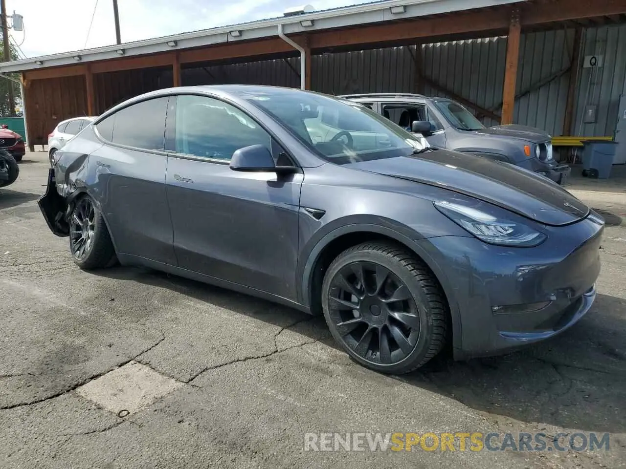 4 Photograph of a damaged car 7SAYGDEEXNF356834 TESLA MODEL Y 2022