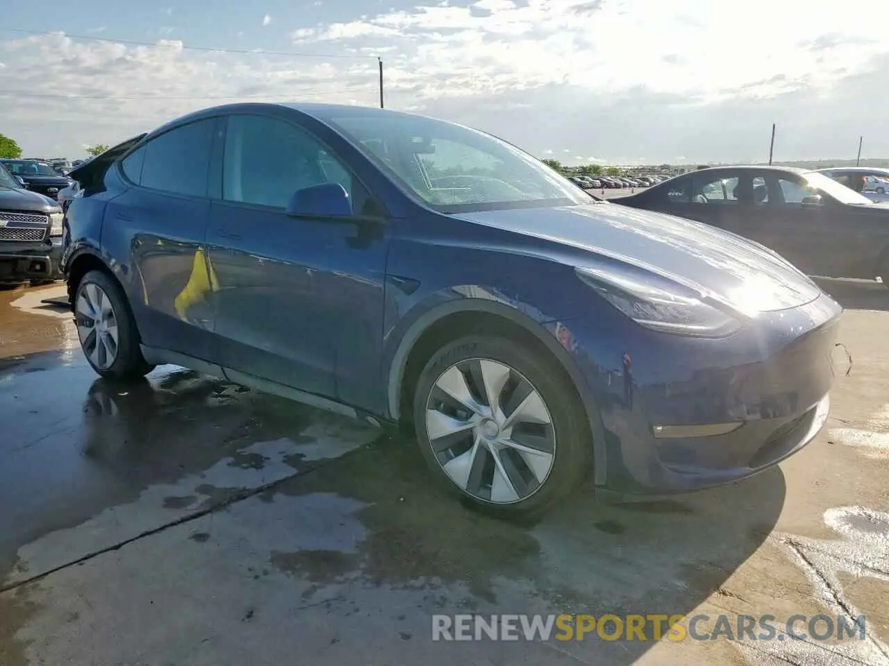 4 Photograph of a damaged car 7SAYGDEEXNF372693 TESLA MODEL Y 2022
