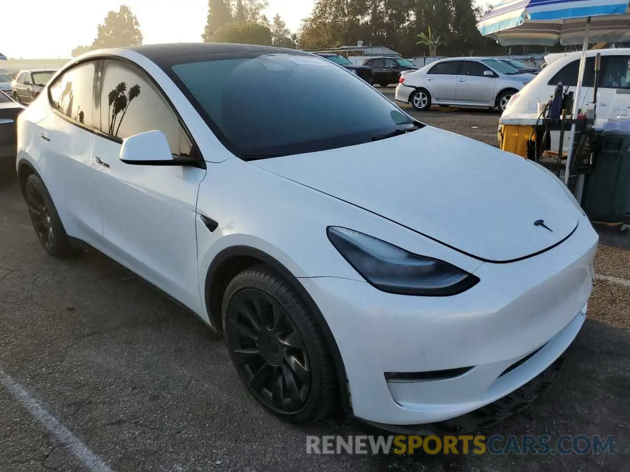 4 Photograph of a damaged car 7SAYGDEEXNF380521 TESLA MODEL Y 2022