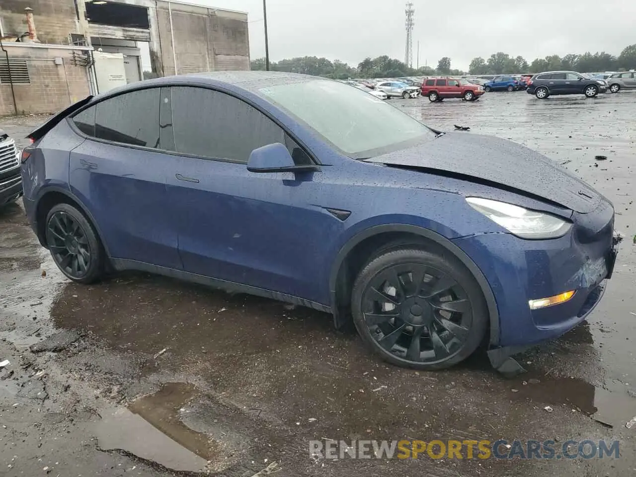 4 Photograph of a damaged car 7SAYGDEEXNF481008 TESLA MODEL Y 2022