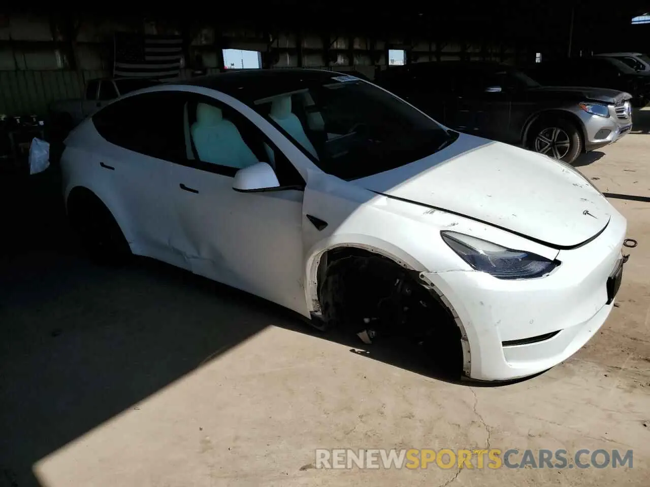 4 Photograph of a damaged car 7SAYGDEF0NF337959 TESLA MODEL Y 2022