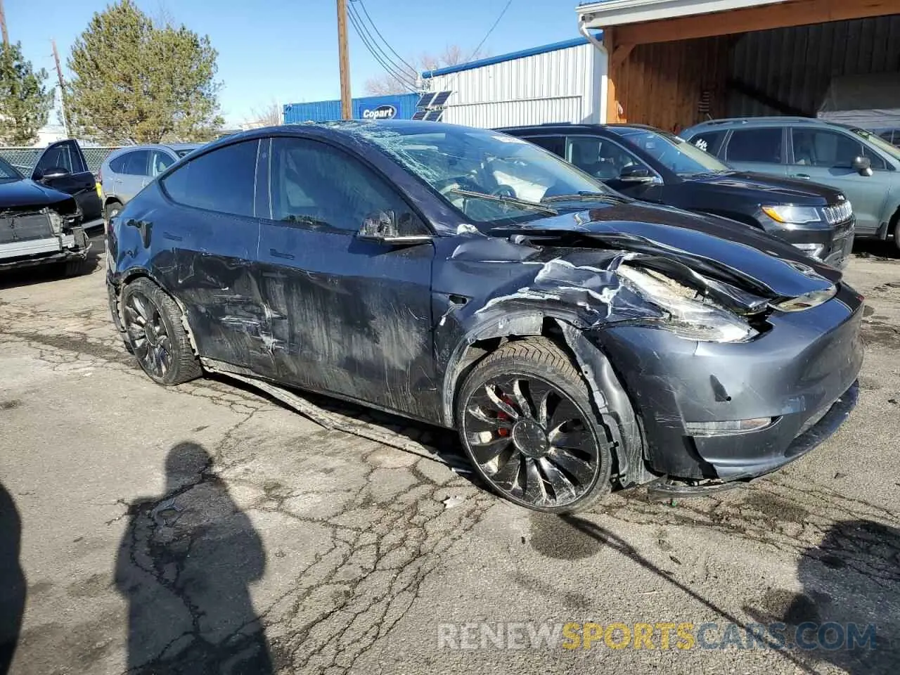 4 Photograph of a damaged car 7SAYGDEF0NF452111 TESLA MODEL Y 2022