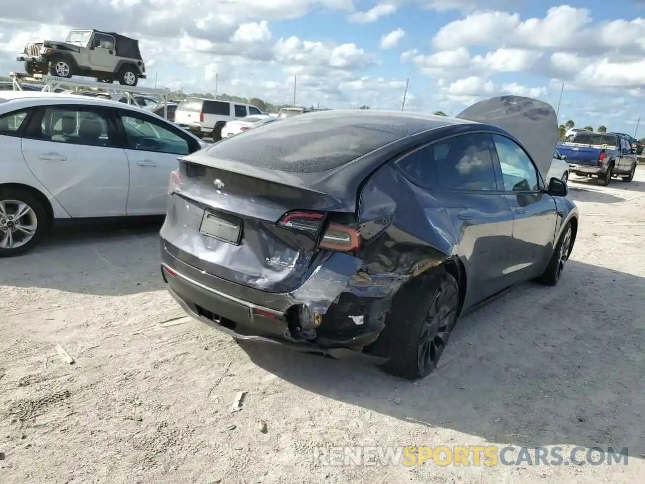 4 Photograph of a damaged car 7SAYGDEF0NF494634 TESLA MODEL Y 2022