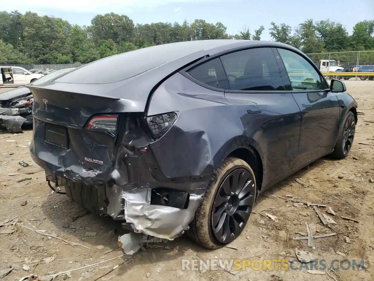 4 Photograph of a damaged car 7SAYGDEF1NF373532 TESLA MODEL Y 2022