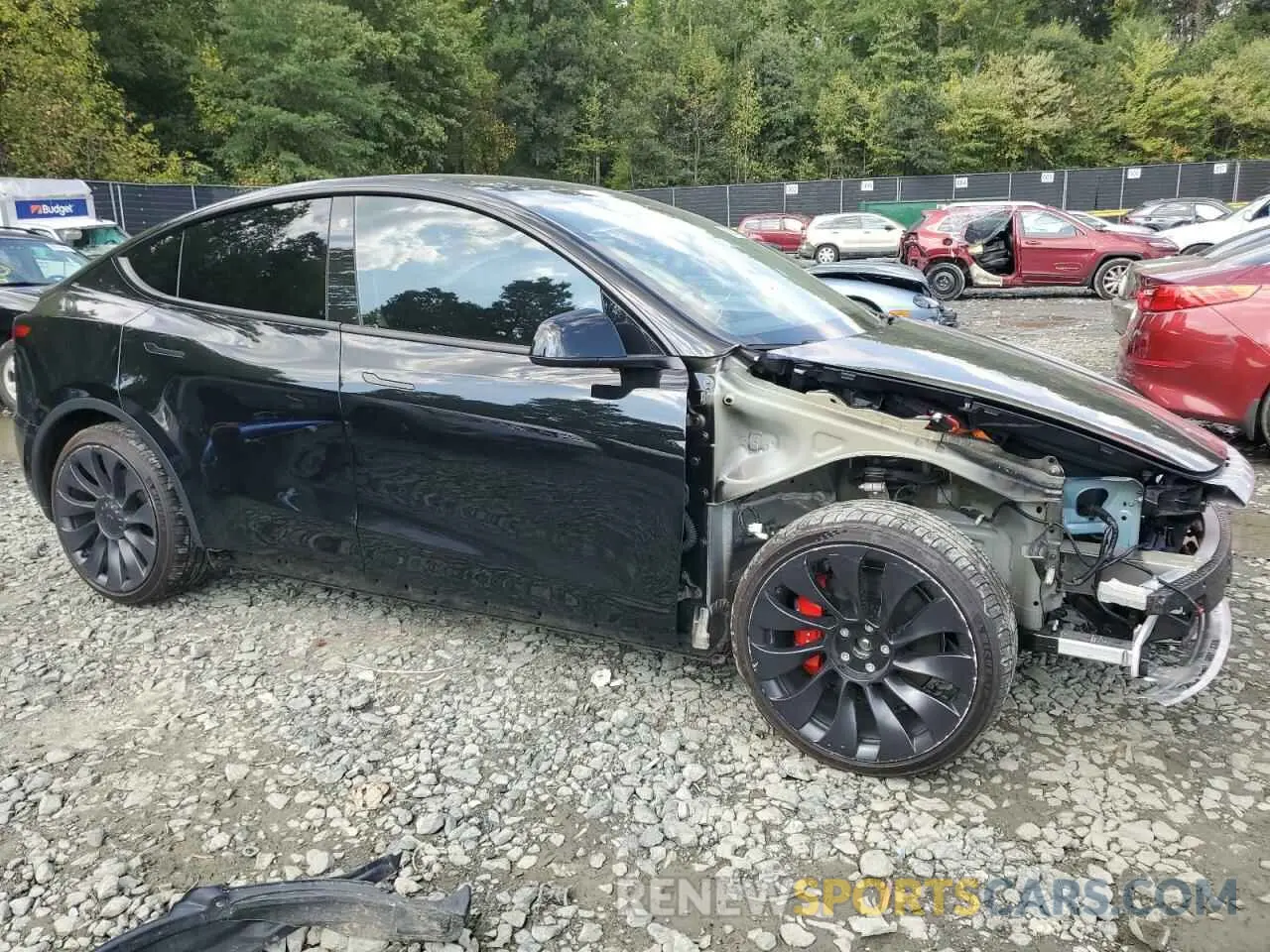 4 Photograph of a damaged car 7SAYGDEF1NF516446 TESLA MODEL Y 2022