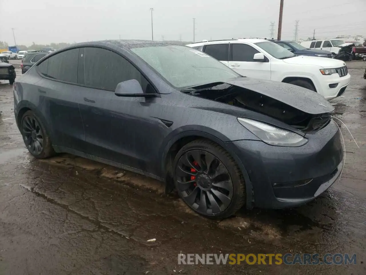 4 Photograph of a damaged car 7SAYGDEF1NF550984 TESLA MODEL Y 2022