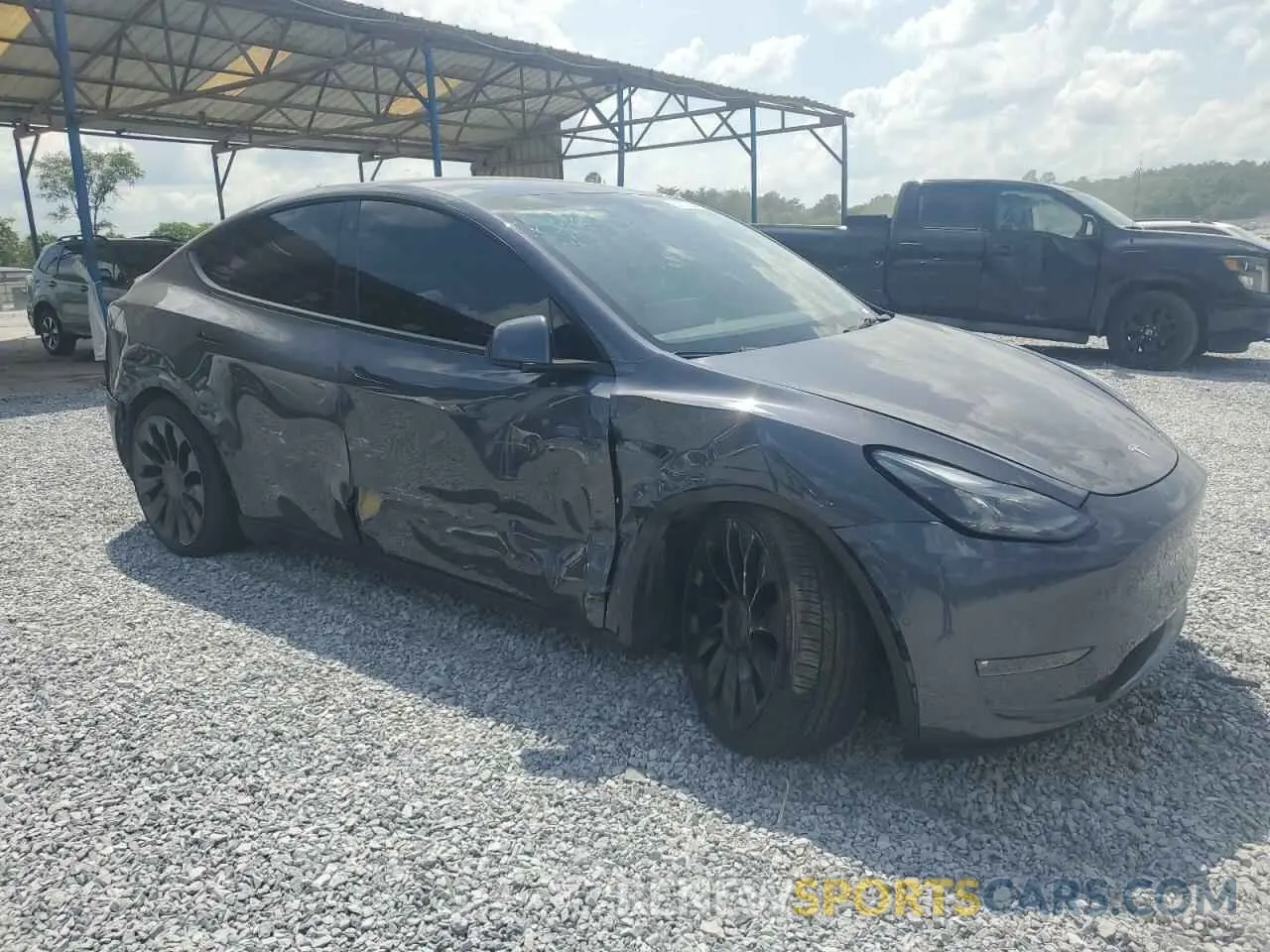 4 Photograph of a damaged car 7SAYGDEF2NF518223 TESLA MODEL Y 2022
