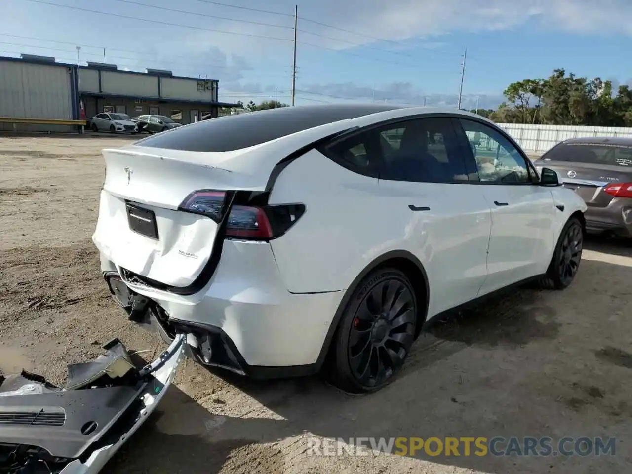 4 Photograph of a damaged car 7SAYGDEF3NF398142 TESLA MODEL Y 2022