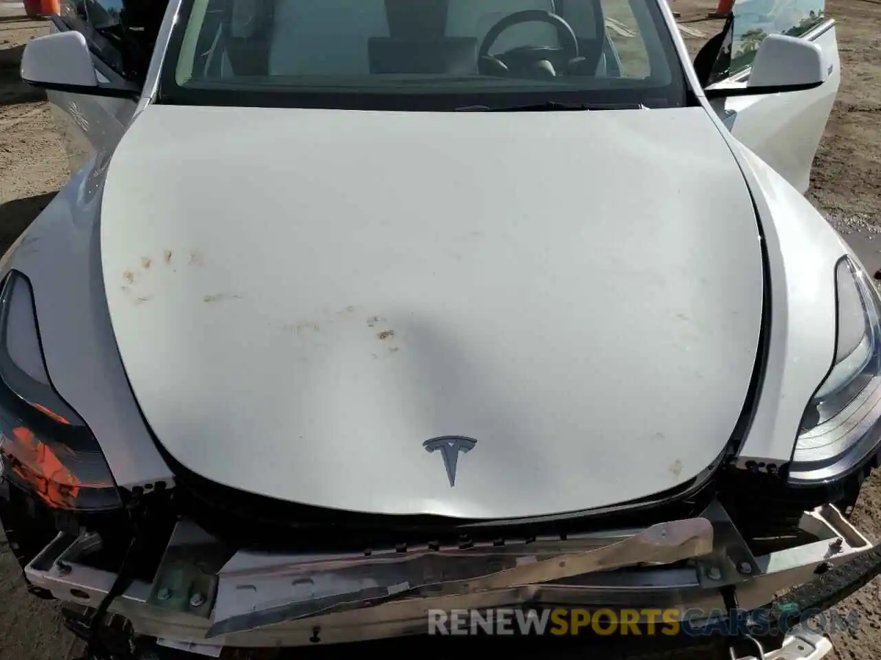 7 Photograph of a damaged car 7SAYGDEF3NF398142 TESLA MODEL Y 2022