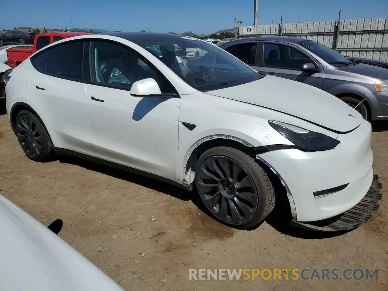 4 Photograph of a damaged car 7SAYGDEF3NF486656 TESLA MODEL Y 2022