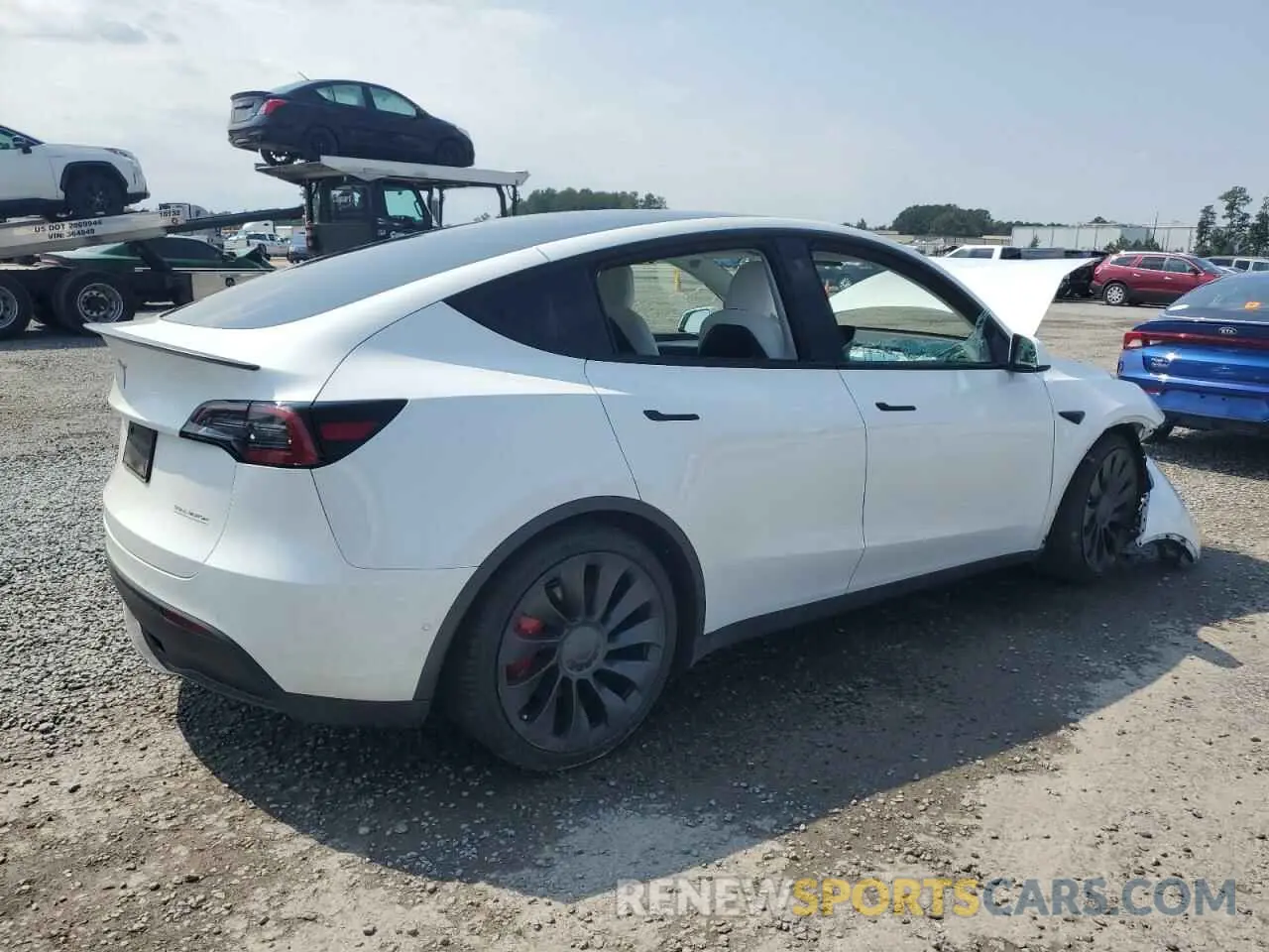 3 Photograph of a damaged car 7SAYGDEF3NF524130 TESLA MODEL Y 2022