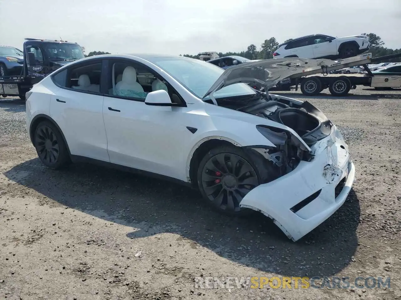 4 Photograph of a damaged car 7SAYGDEF3NF524130 TESLA MODEL Y 2022