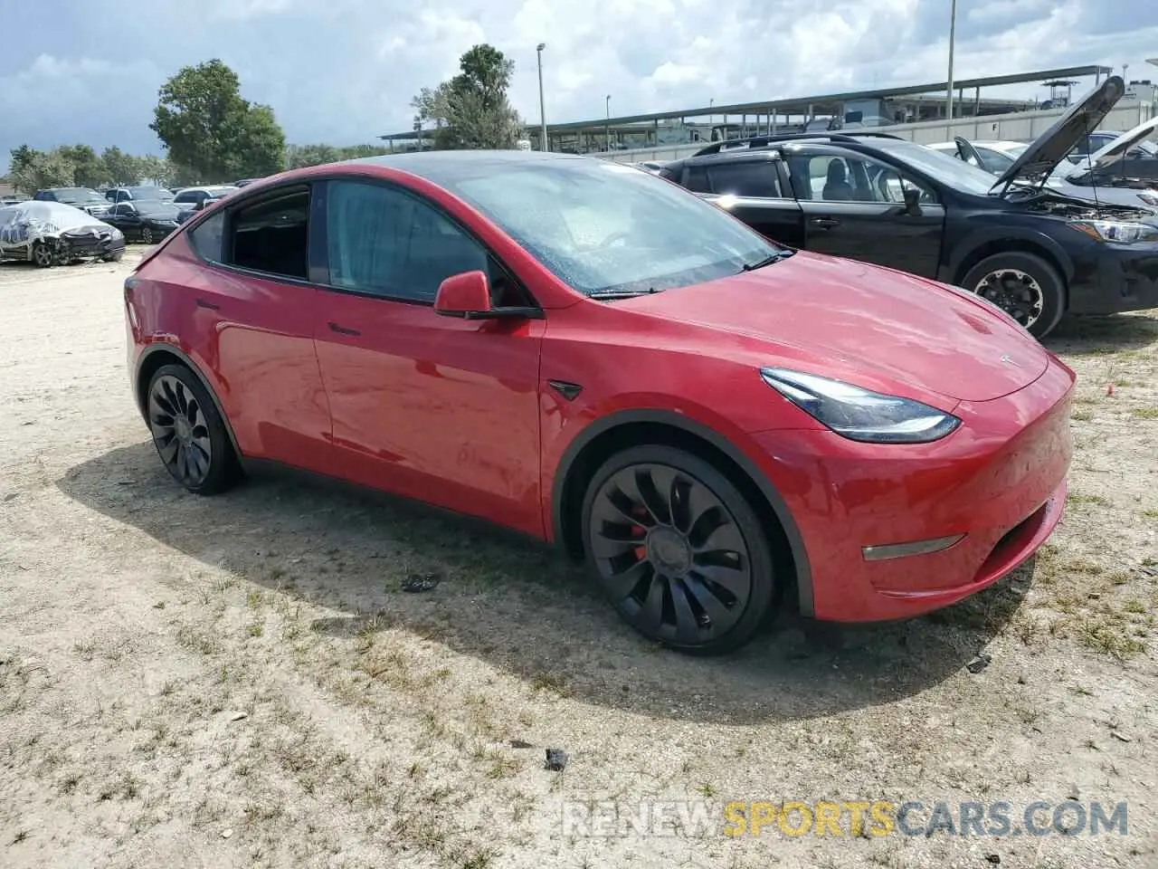 4 Photograph of a damaged car 7SAYGDEF3NF534172 TESLA MODEL Y 2022