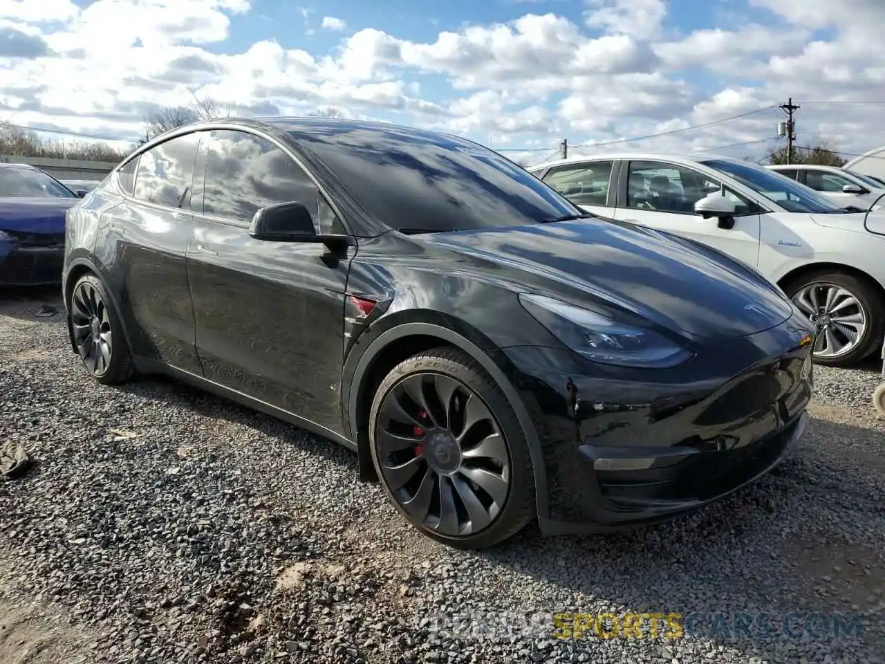 4 Photograph of a damaged car 7SAYGDEF4NF449499 TESLA MODEL Y 2022