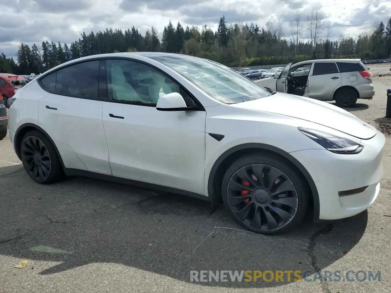 4 Photograph of a damaged car 7SAYGDEF4NF518109 TESLA MODEL Y 2022