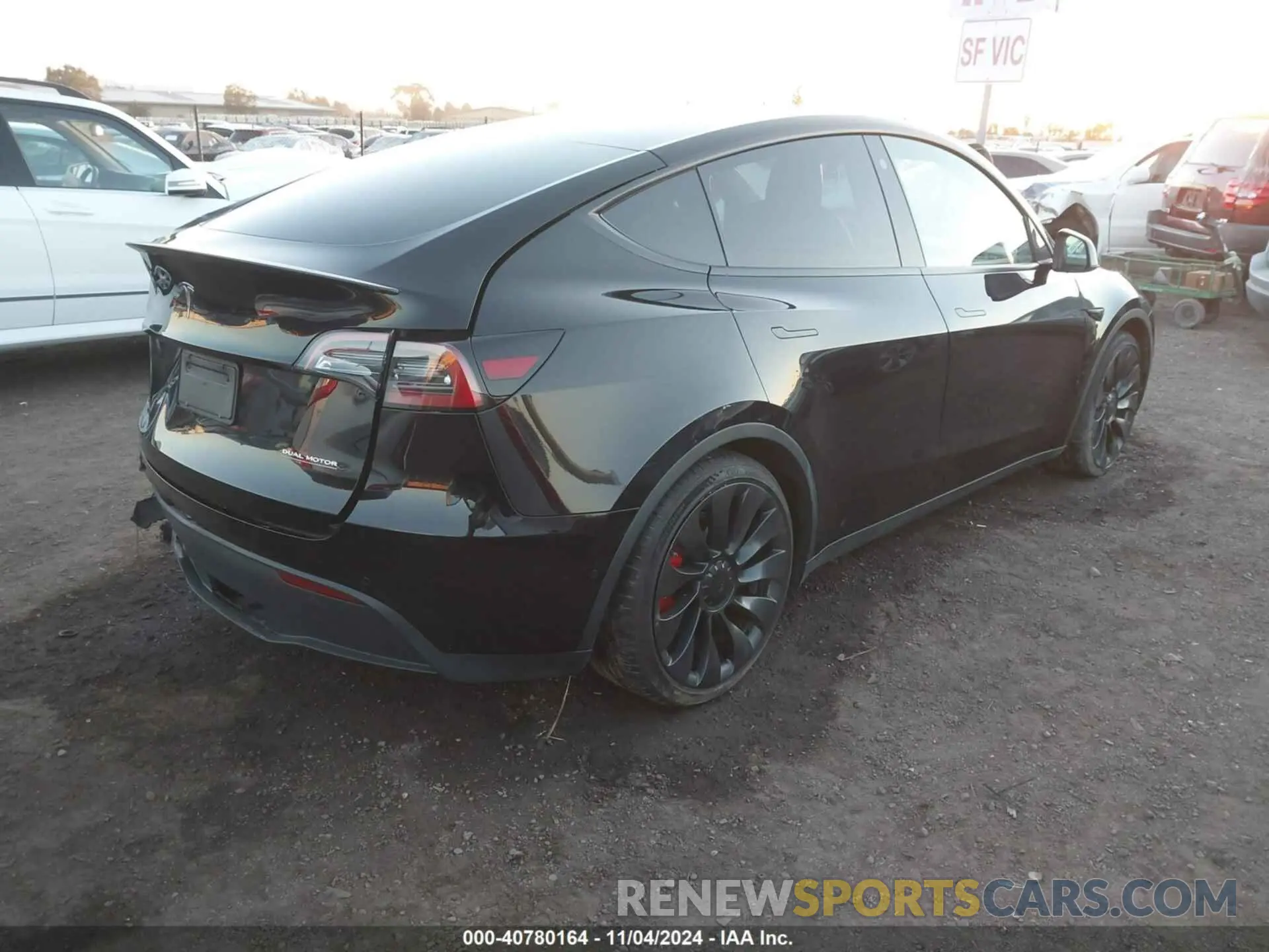 4 Photograph of a damaged car 7SAYGDEF4NF546427 TESLA MODEL Y 2022