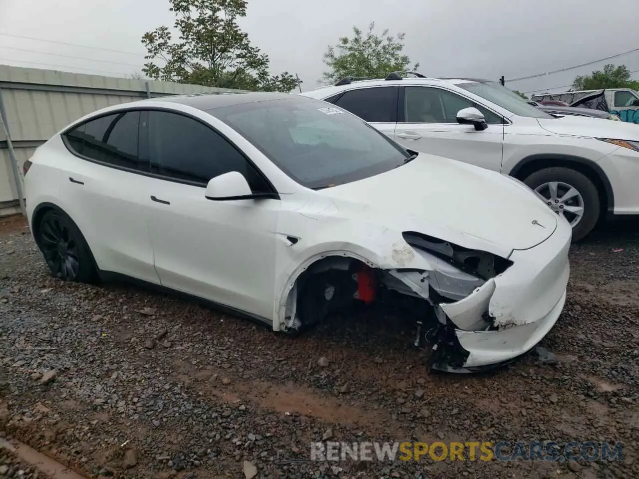 4 Photograph of a damaged car 7SAYGDEF4NF564278 TESLA MODEL Y 2022