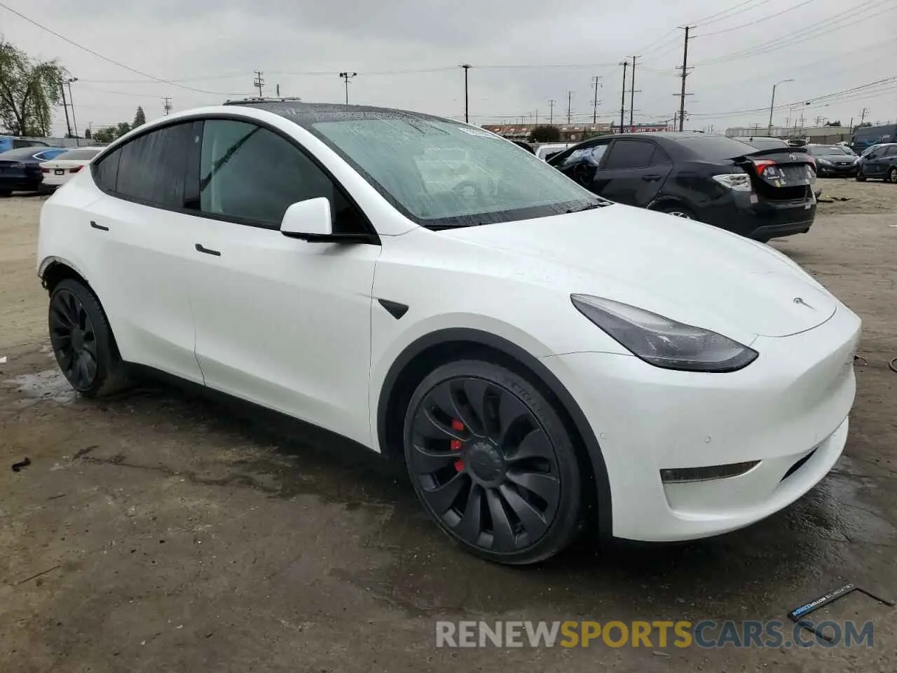 4 Photograph of a damaged car 7SAYGDEF6NF324360 TESLA MODEL Y 2022