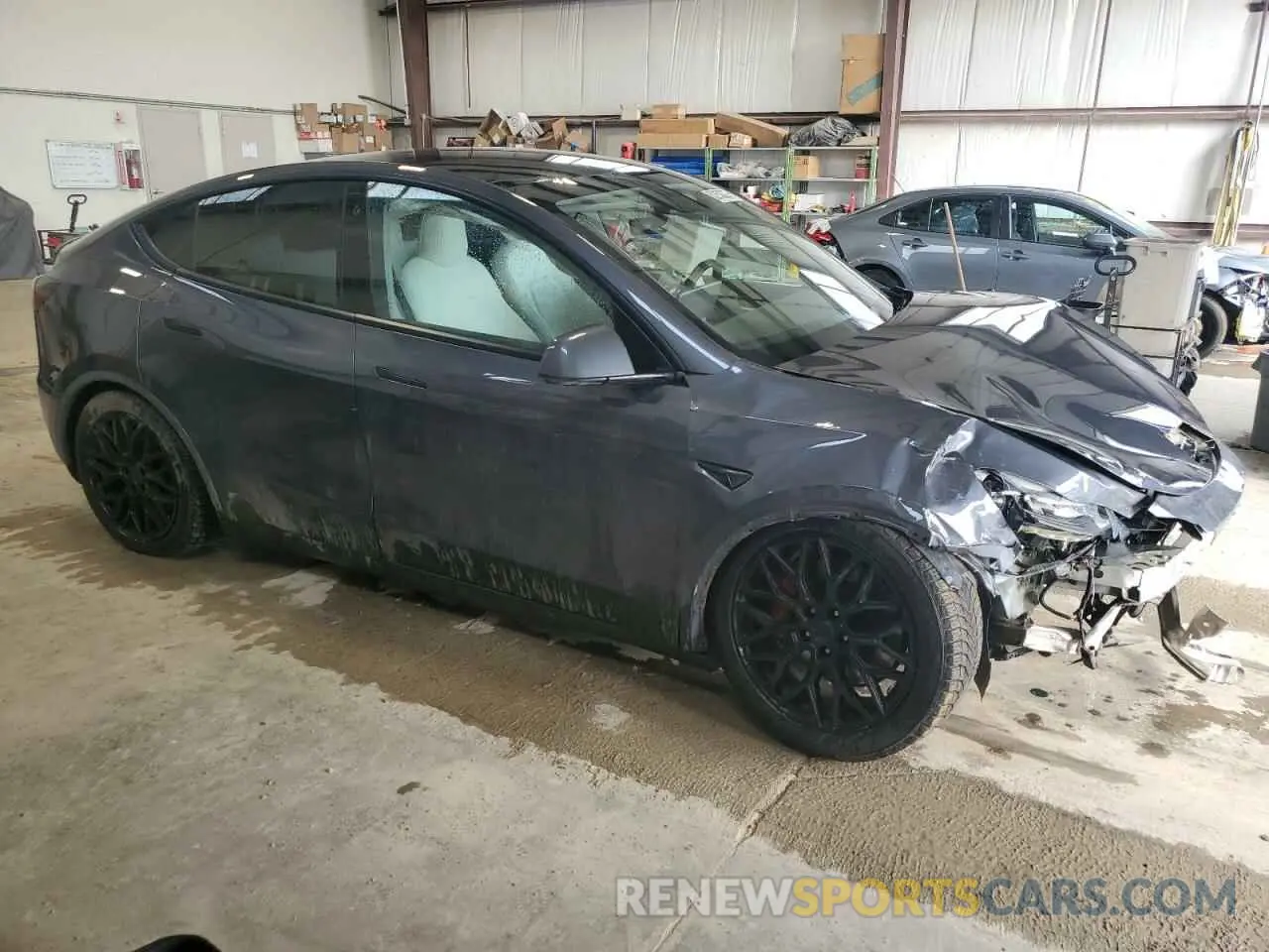 4 Photograph of a damaged car 7SAYGDEF6NF327016 TESLA MODEL Y 2022