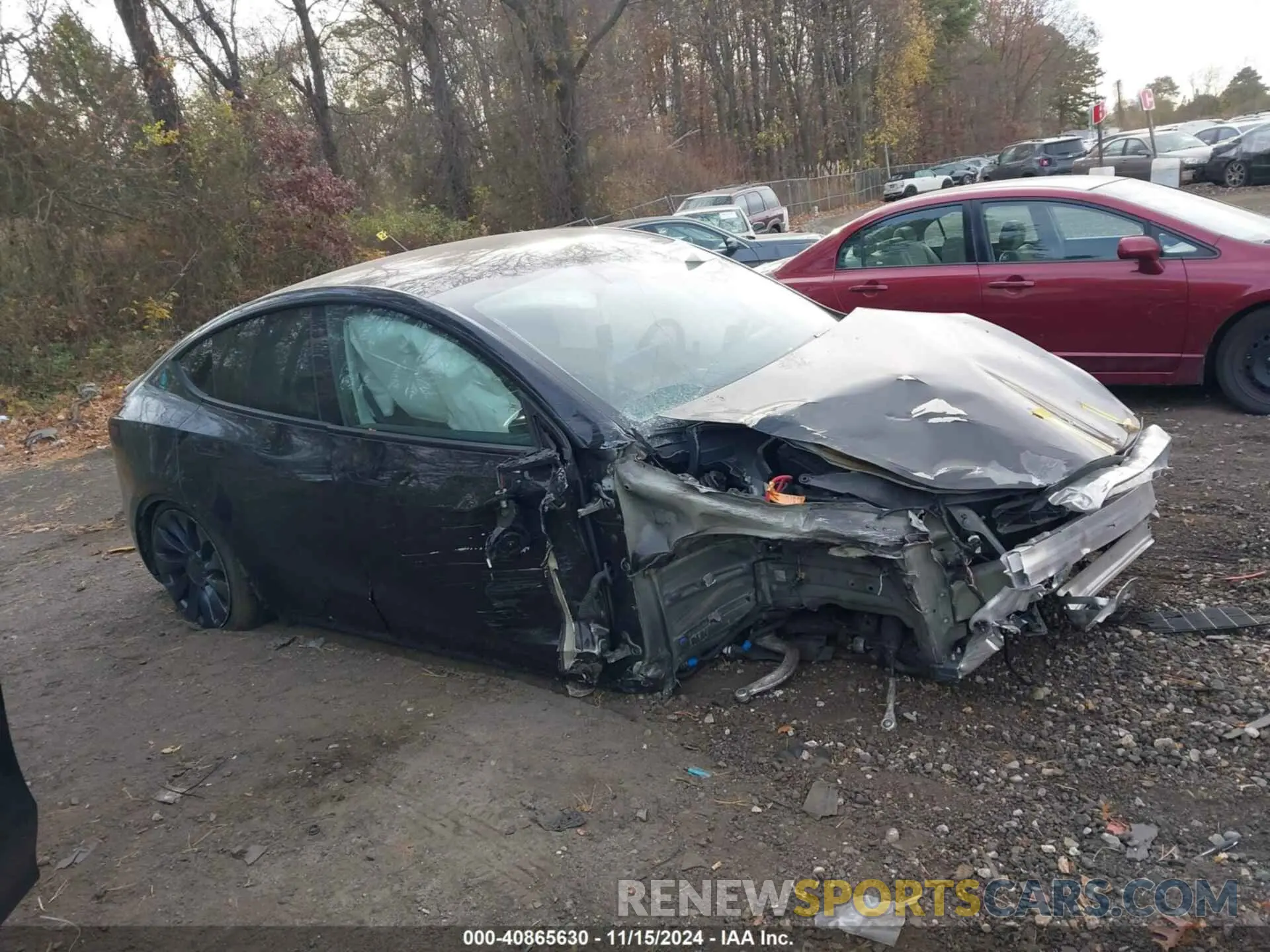 12 Photograph of a damaged car 7SAYGDEF6NF531105 TESLA MODEL Y 2022