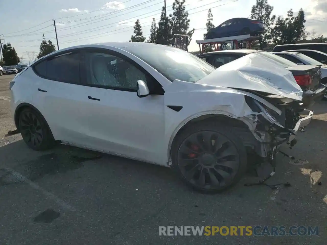 4 Photograph of a damaged car 7SAYGDEF7NF392473 TESLA MODEL Y 2022