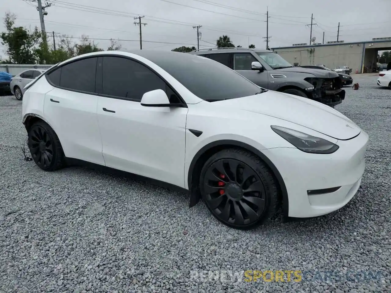 4 Photograph of a damaged car 7SAYGDEF7NF537009 TESLA MODEL Y 2022