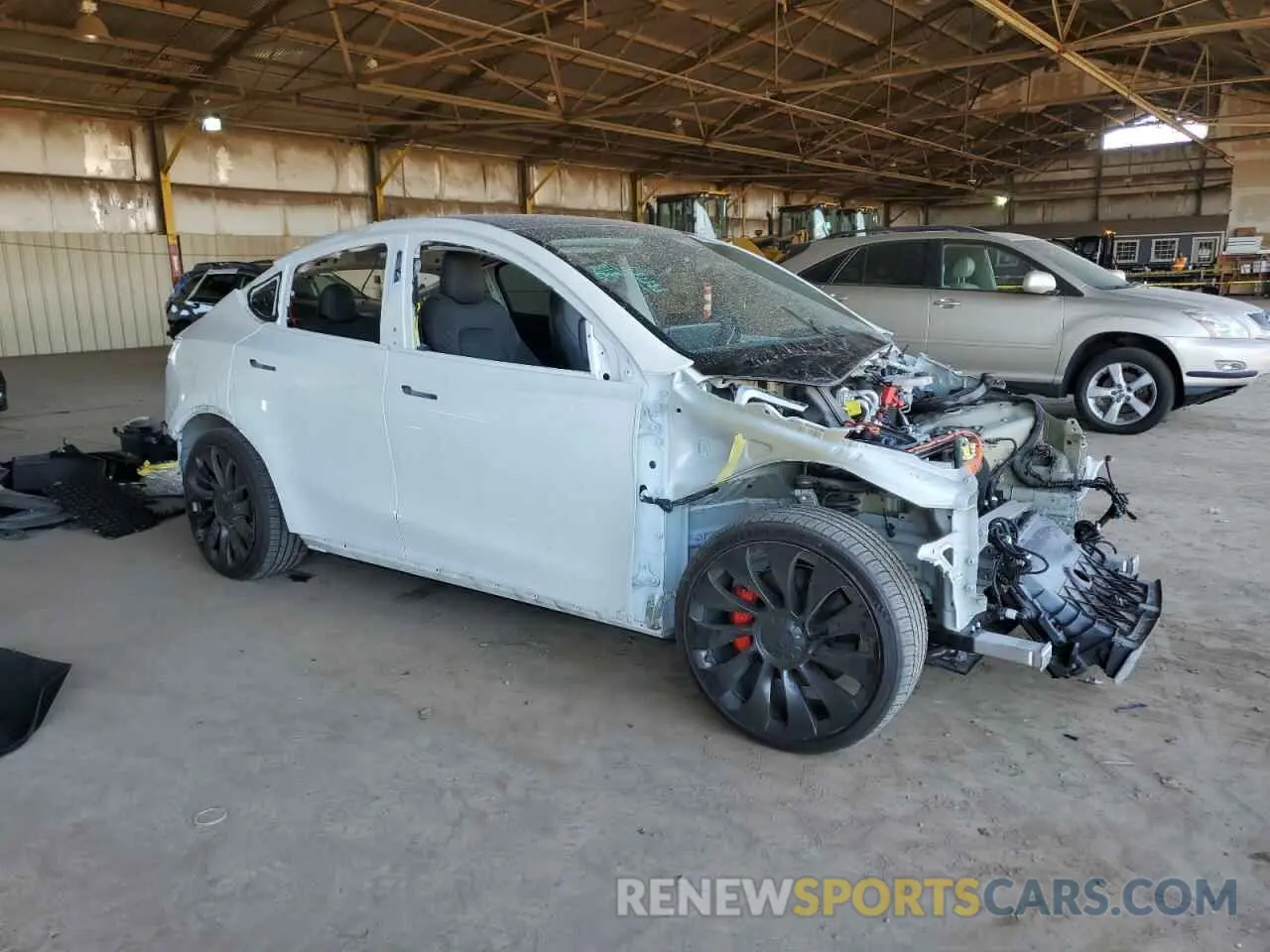 4 Photograph of a damaged car 7SAYGDEF8NF489908 TESLA MODEL Y 2022