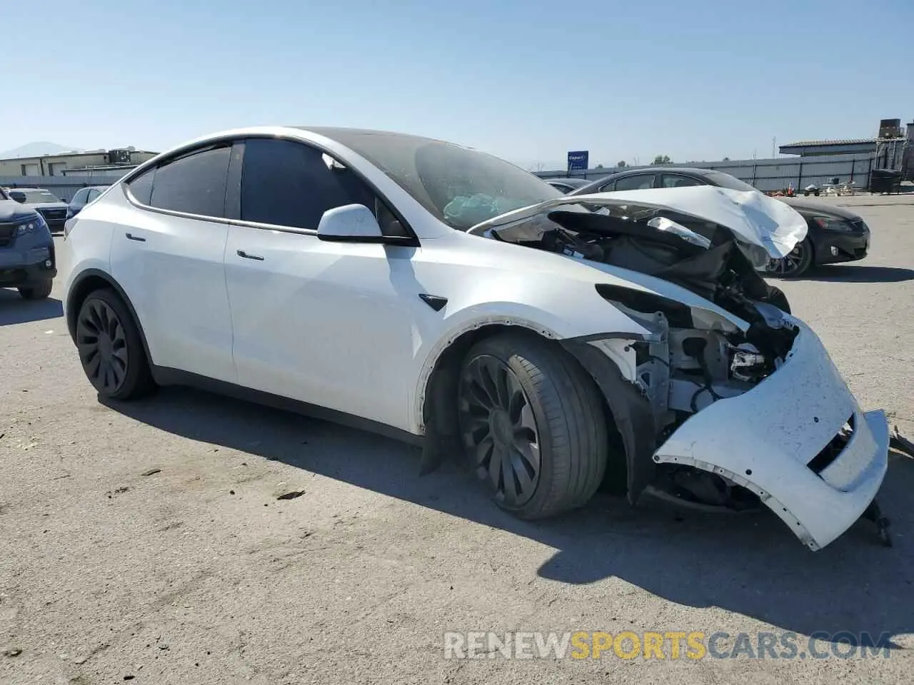 4 Photograph of a damaged car 7SAYGDEF9NF392197 TESLA MODEL Y 2022