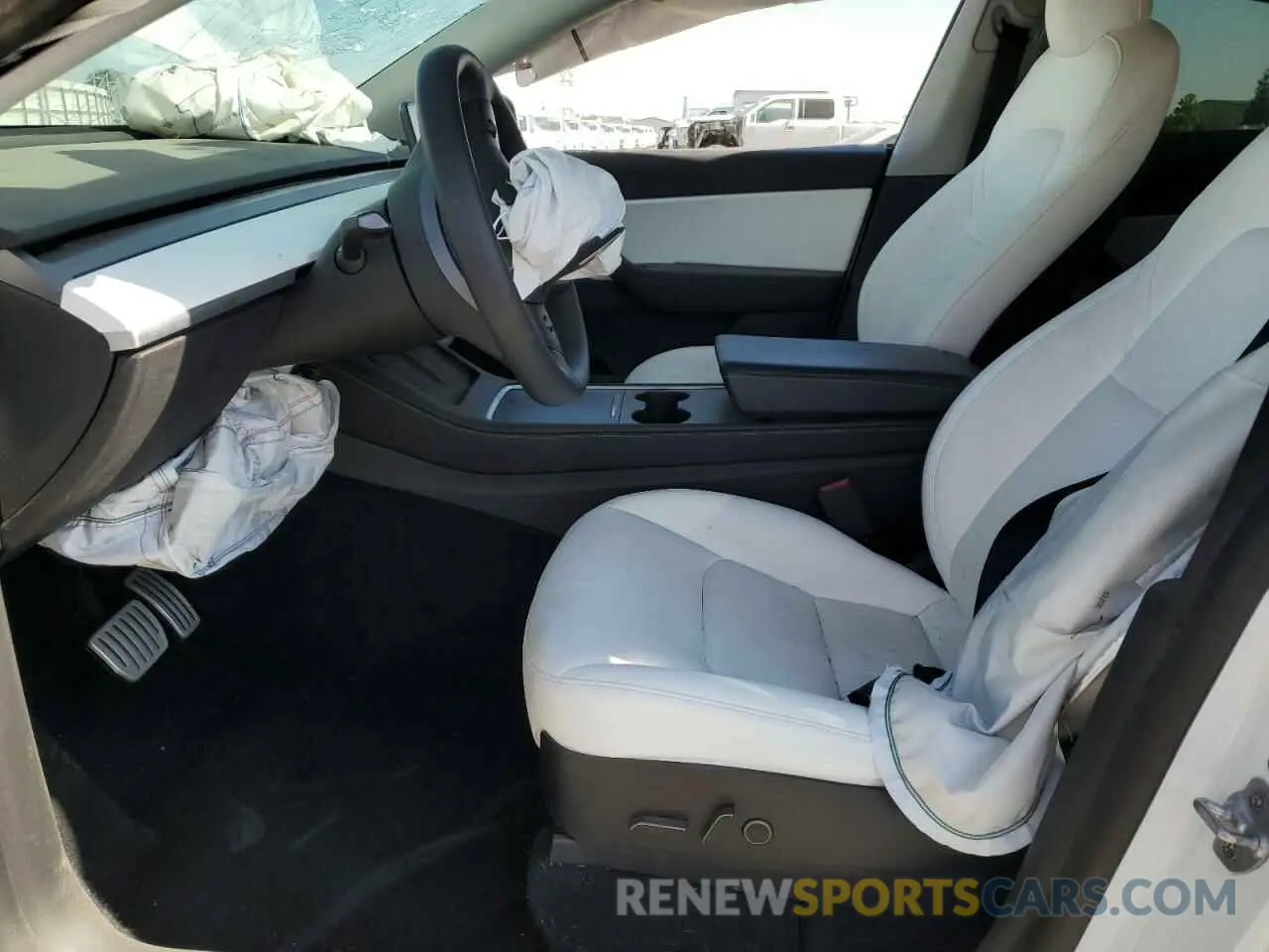 7 Photograph of a damaged car 7SAYGDEF9NF392197 TESLA MODEL Y 2022