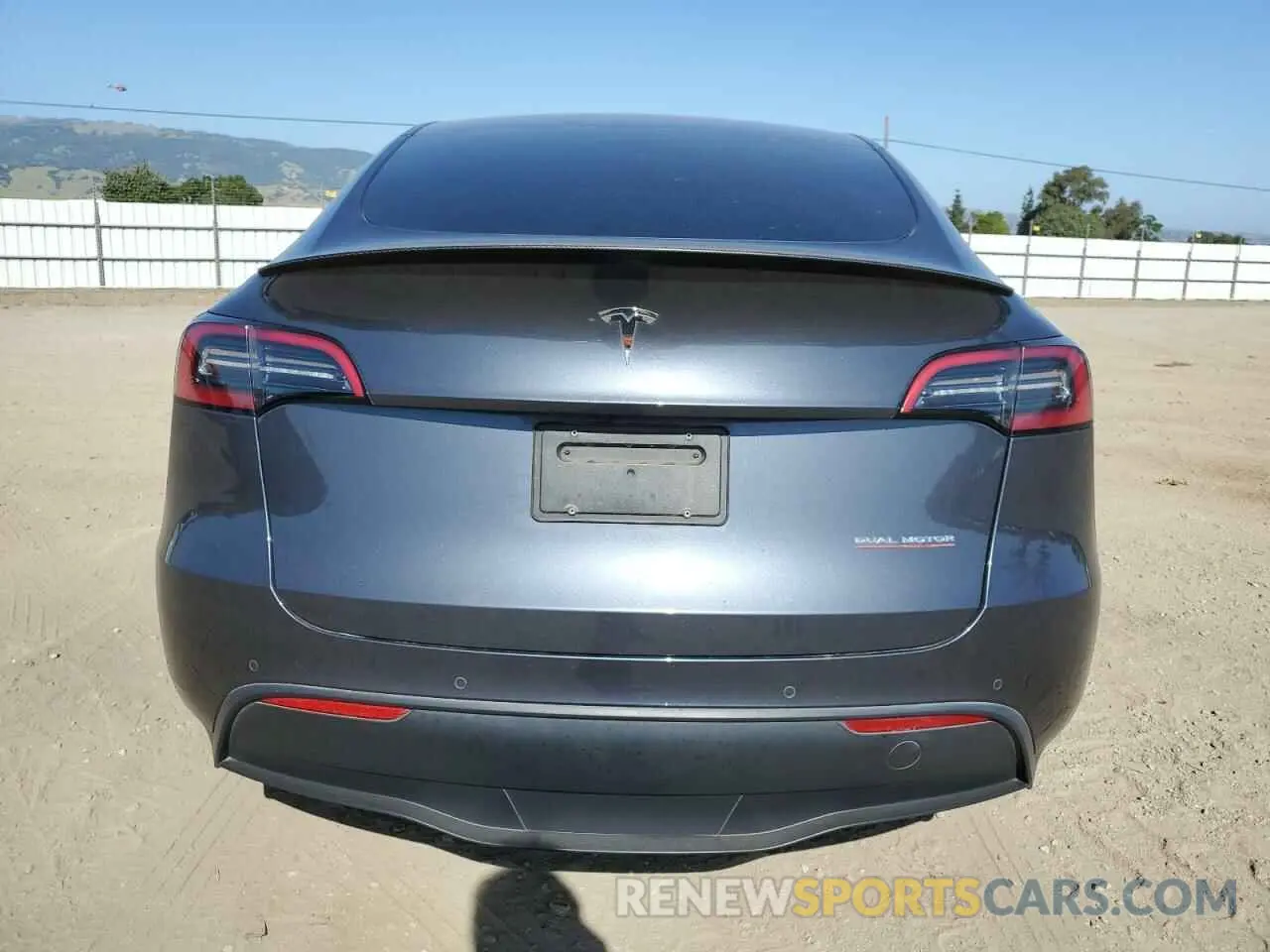 6 Photograph of a damaged car 7SAYGDEFXNF521502 TESLA MODEL Y 2022