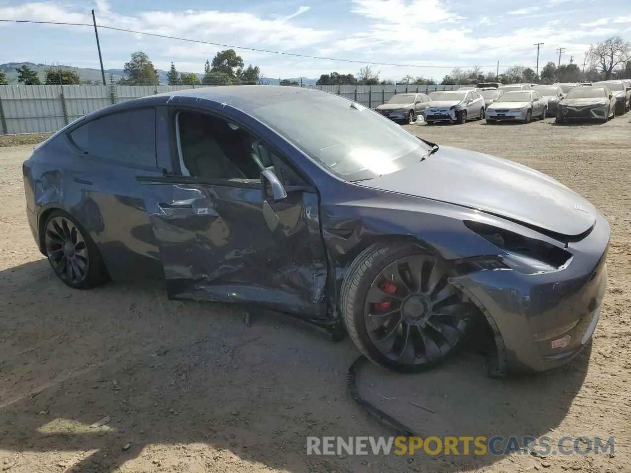 4 Photograph of a damaged car 7SAYGDEFXNF544214 TESLA MODEL Y 2022