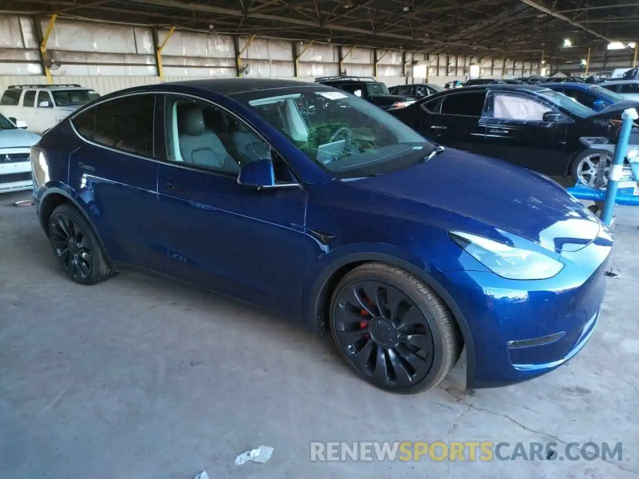 4 Photograph of a damaged car 7SAYGDEFXNF548831 TESLA MODEL Y 2022