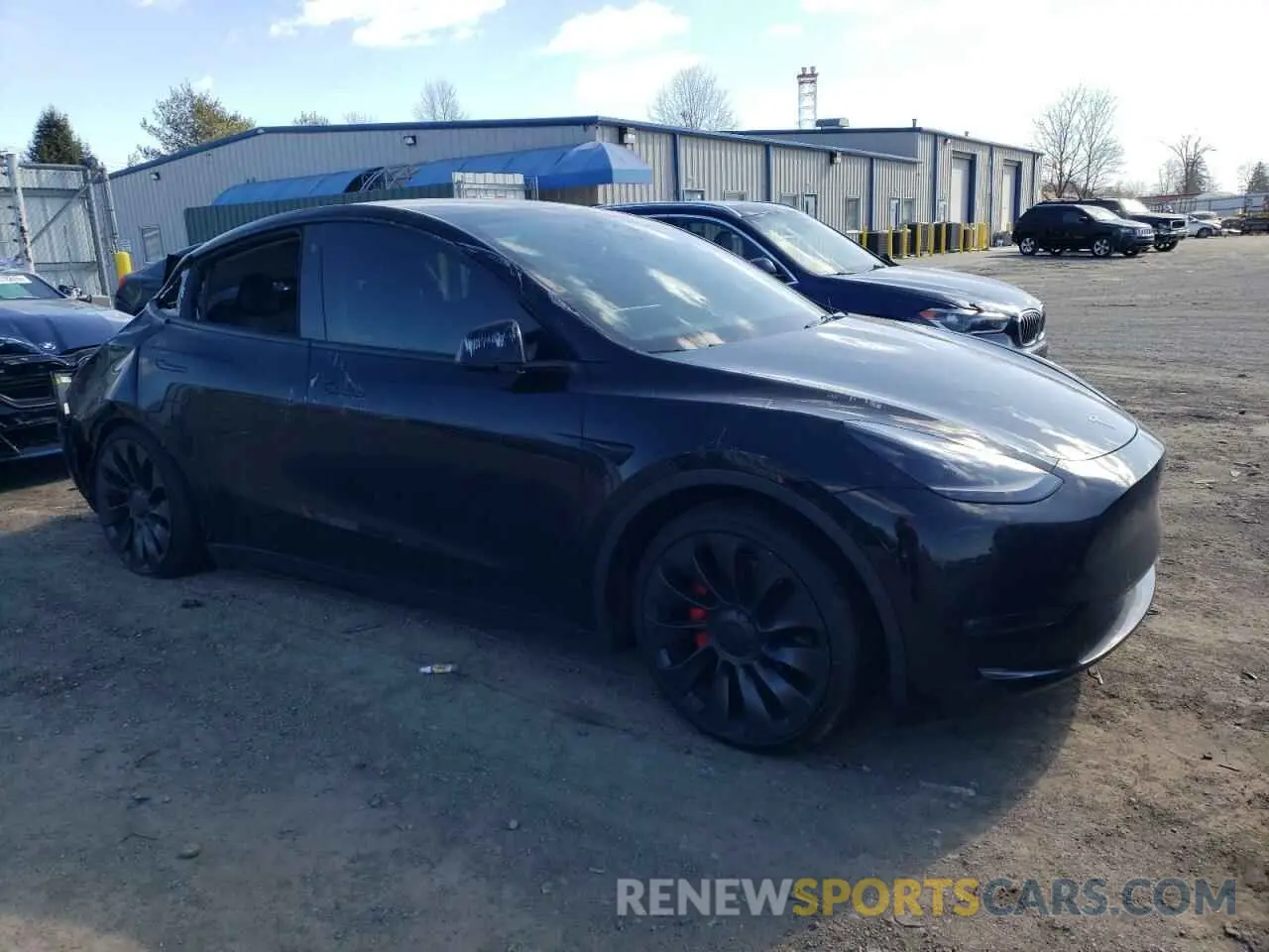 4 Photograph of a damaged car 7SAYGDEFXNF563443 TESLA MODEL Y 2022