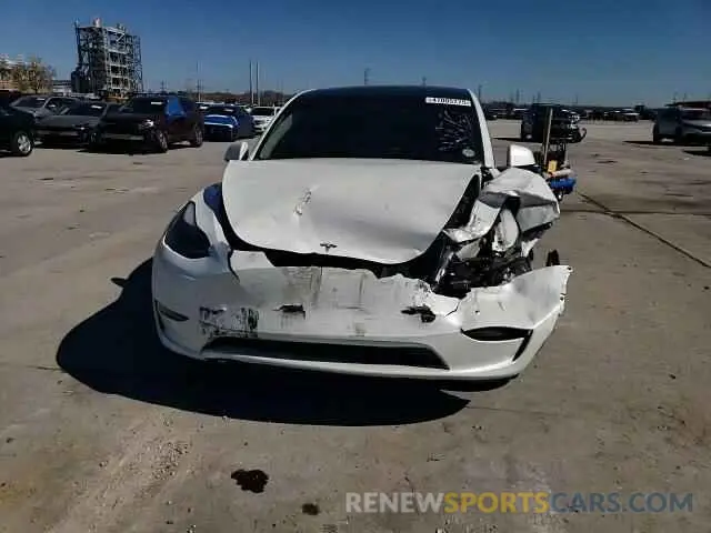 11 Photograph of a damaged car 7SAYGAEE0PF686760 TESLA MODEL Y 2023