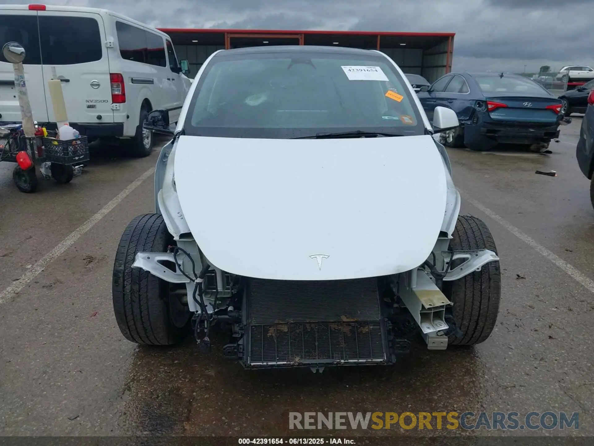 13 Photograph of a damaged car 7SAYGAEE0PF744494 TESLA MODEL Y 2023