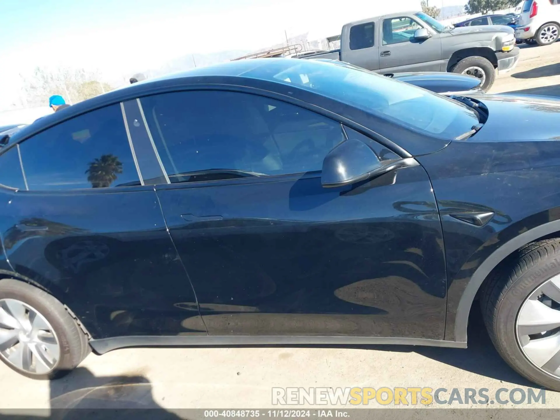 13 Photograph of a damaged car 7SAYGAEE0PF868345 TESLA MODEL Y 2023