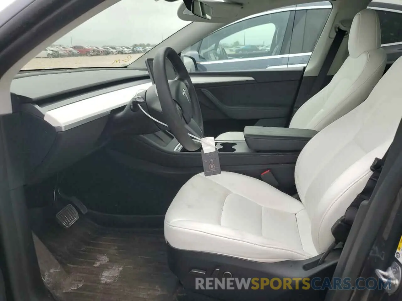 7 Photograph of a damaged car 7SAYGAEE0PF890667 TESLA MODEL Y 2023