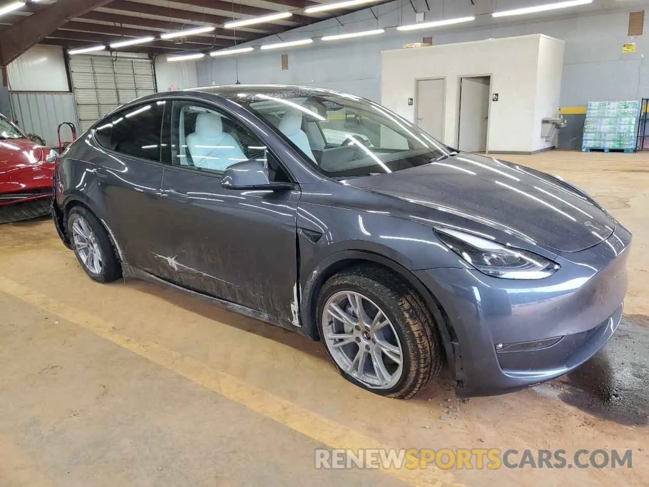 4 Photograph of a damaged car 7SAYGAEE0PF948454 TESLA MODEL Y 2023