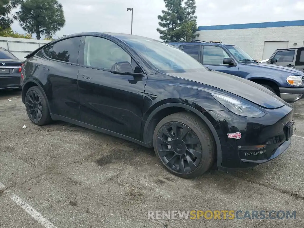 4 Photograph of a damaged car 7SAYGAEE1PF698125 TESLA MODEL Y 2023