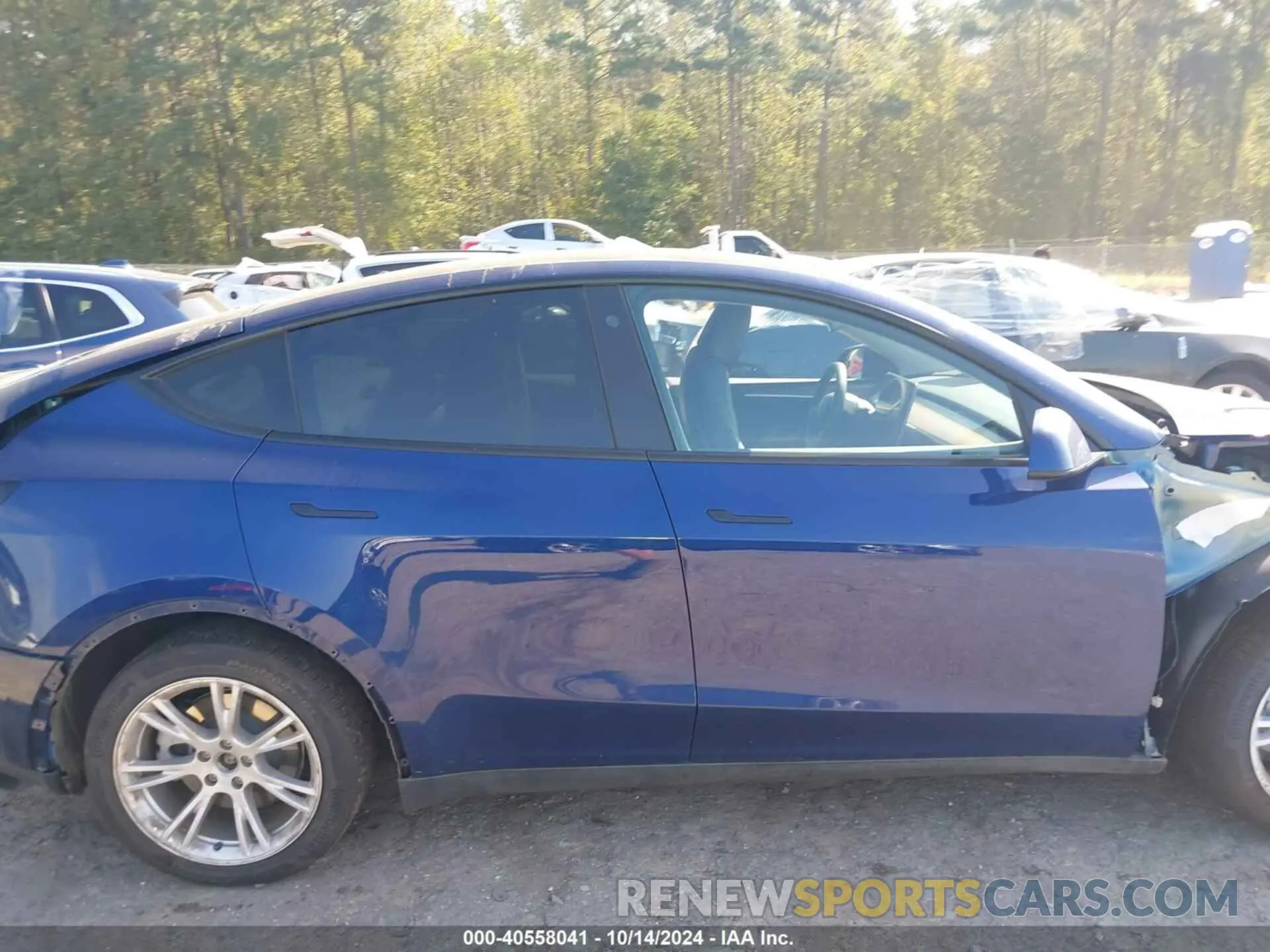 14 Photograph of a damaged car 7SAYGAEE1PF701752 TESLA MODEL Y 2023