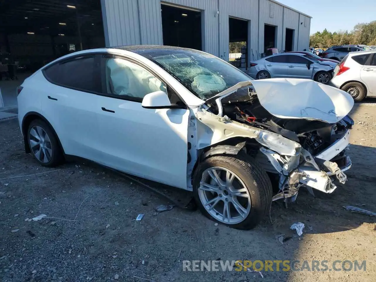 4 Photograph of a damaged car 7SAYGAEE1PF810888 TESLA MODEL Y 2023
