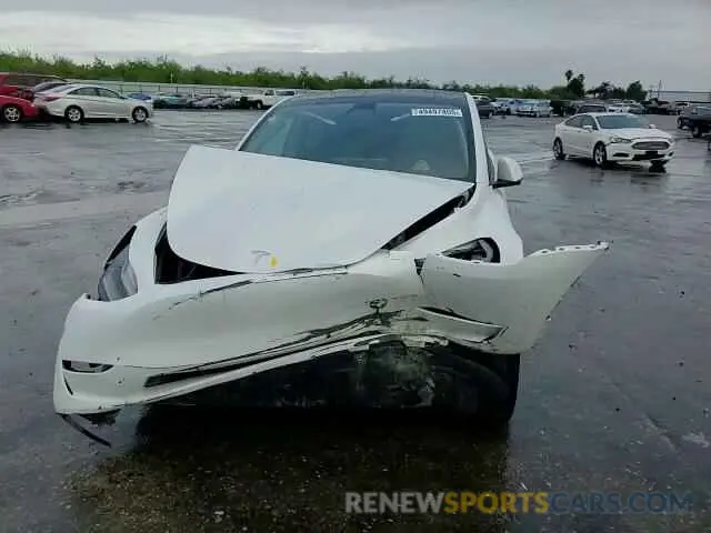 11 Photograph of a damaged car 7SAYGAEE2PF753228 TESLA MODEL Y 2023