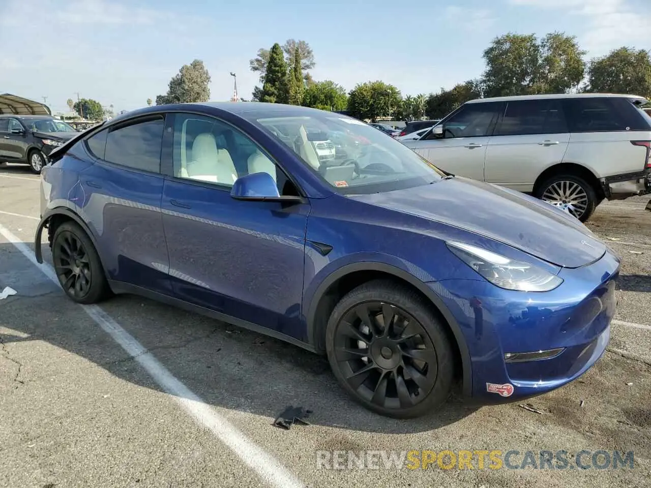 4 Photograph of a damaged car 7SAYGAEE2PF823875 TESLA MODEL Y 2023