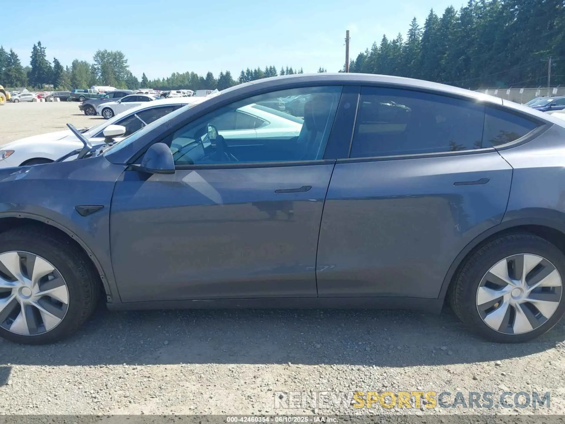 15 Photograph of a damaged car 7SAYGAEE2PF910479 TESLA MODEL Y 2023