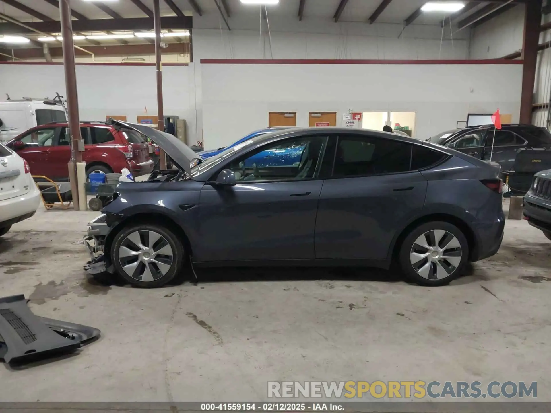 14 Photograph of a damaged car 7SAYGAEE3PF690592 TESLA MODEL Y 2023
