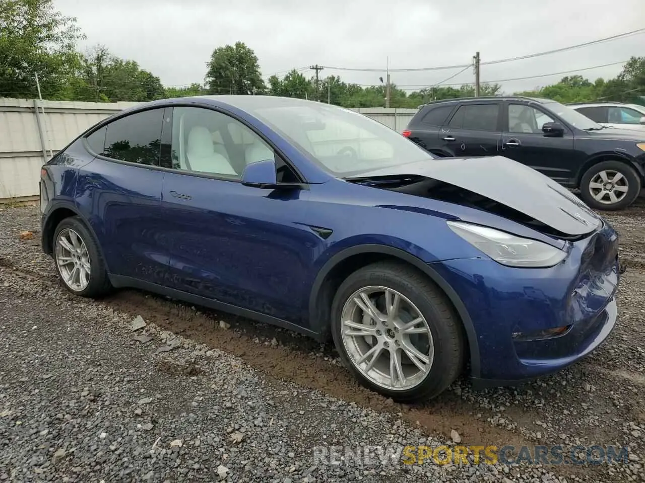 4 Photograph of a damaged car 7SAYGAEE3PF764769 TESLA MODEL Y 2023